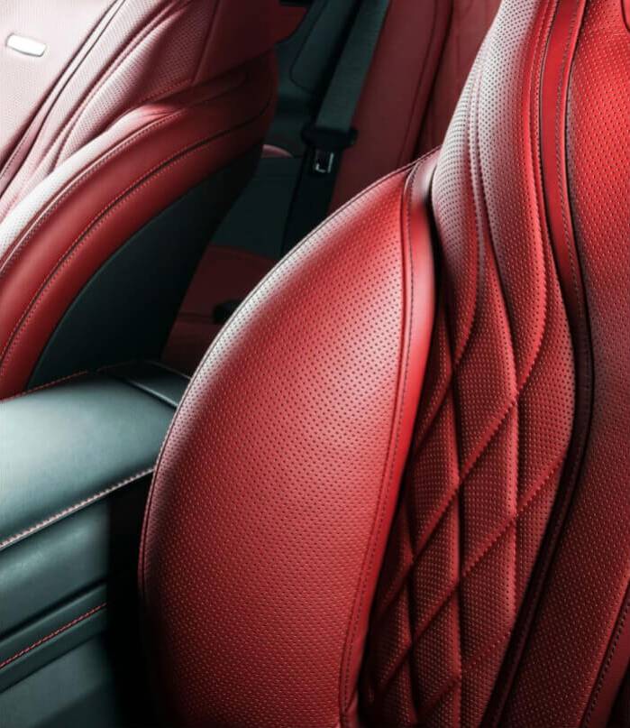 Luxury car interior with red leather seats